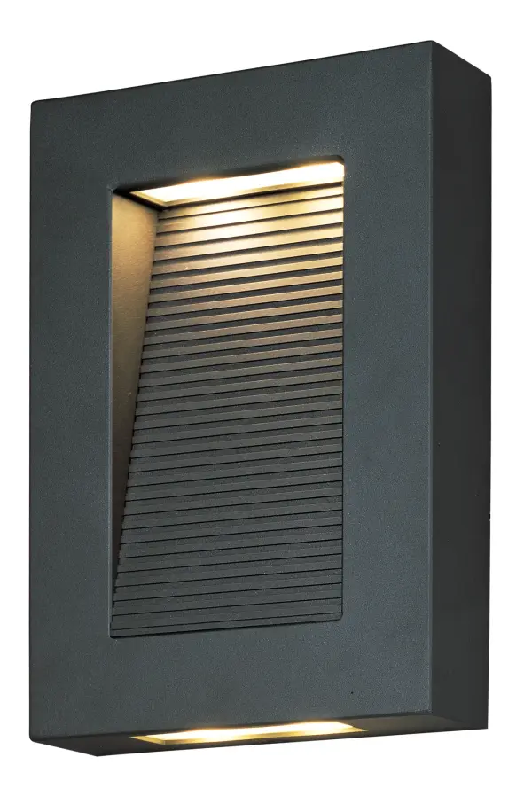 This great architectural outdoor design provides illumination from two places. A slash of light washes down the grated diffuser and out away from the wall while additional light is directed out the bottom straight down that washes the wall and illuminates the walkway below. Available In three sizes and finished in Architectural Bronze.