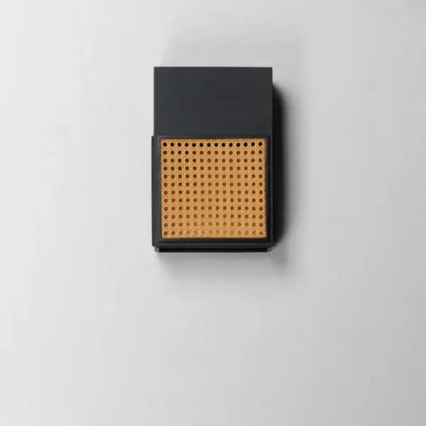 Modeled on open weave wicker stitchwork and constructed using synthetic rattan for longevity, this series of wall sconces are rated for both interiors and outdoors. Matte Black frames are paired with either Natural Rattan or a matching Black finish. This homespun concept pays homage to the outdoors with relevant styling and timeless appeal. Collection: Lattice Finish: Black Width: 8.00" Height: 12.00" Weight: 5.50 lb Extension from Wall: 4.75" Wire: 8" Canopy: 5"x6" Bulbs Included Number of Bulbs: 1 Maximum Wattage: 12.00 W Bulb Type: LED Bulb Base: Integrated Light Source: LED Light Output: 500.00 lm Color Temperature: 3000 K CRI: 90 Rated Average Life: 35000 Voltage: 120.00 V Material: Aluminum, Synthetic Rattan Safety Listing: cETLus Safety Rating: Wet Dark Sky LED Spec Sheet Instructions - alternate view