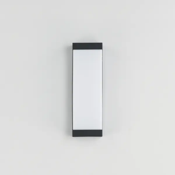 Featuring robust aluminum construction, the Tunnel collection is designed for commercial applications outdoor. A rectilinear form of uniformly illuminated frosted UV-rated acrylic diffuser is framed in Black or Brushed Aluminum metal. Commercially rated, dedicated 120-277V LED components, delivers reliable performance in demanding environments. While ideal for exterior facades, its ADA-compliant extension makes it equally suited for interior spaces such as elevator lobbies, hallways, and meeting rooms. Collection: Tunnel Finish: Black Glass: White Width: 5.00" Height: 15.00" Weight: 6.81 lb Extension from Wall: 4.00" Wire: 8" Canopy: 4.25"x0.75" Bulbs Included Number of Bulbs: 2 Maximum Wattage: 9.00 W Bulb Base: Integrated Light Source: LED Light Output: 900.00 lm Color Temperature: 2700 K CRI: 90 Rated Average Life: 35000 Voltage: 120.00 V Material: Satinledd Steel, Acrylic Safety Listing: cETLus Safety Rating: Wet ADA LED Spec Sheet Instructions - alternate view