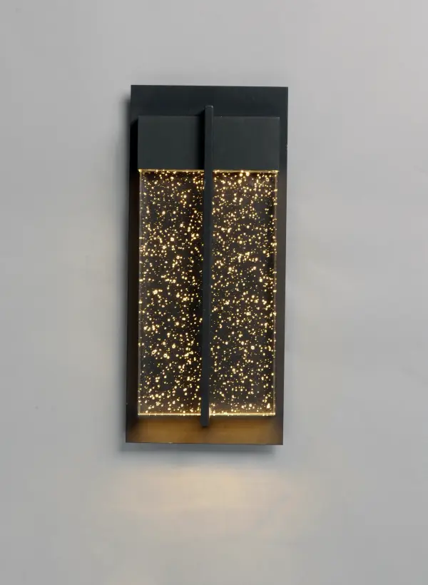 This popular outdoor collection gets an improved facelift and has additional sizes for a more complete collection. The Black finish presents a dramatic background for the solid block of Bubble Glass that is brightly illuminated by the LED concealed in the top housing. - alternate view