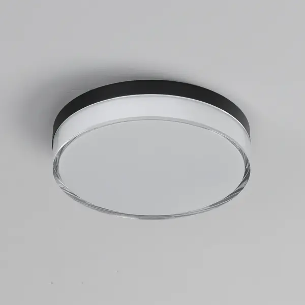 Defined by its contemporary edge, this series of flush mounts and wall sconces features a layered dimensional shade of acrylic. The thick miter cut Clear acrylic encases an inner opal White diffuser that is evenly illuminated by a high-powered integrated LED. Select from 5 different color temperatures using an easily accessible switch on the frame. - alternate view