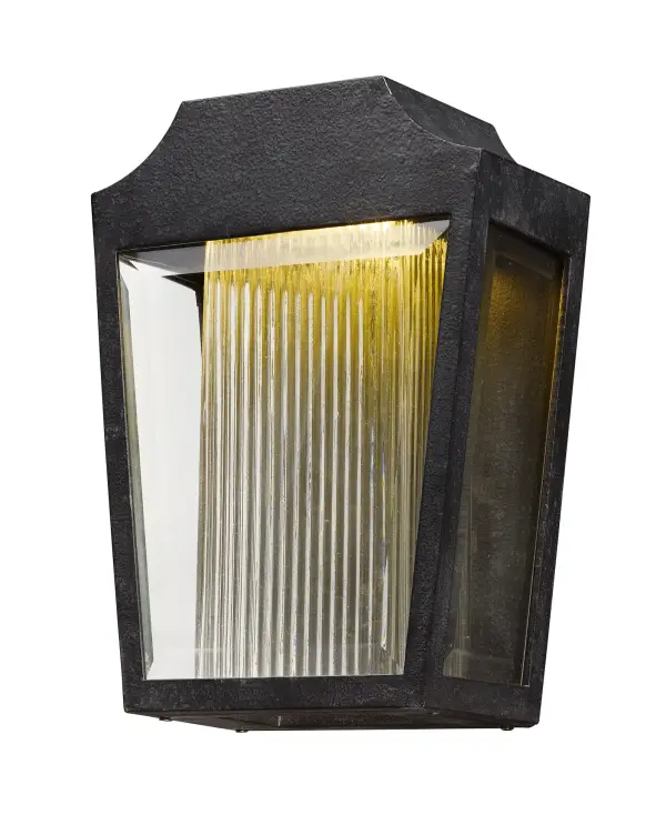 A ribbed glass diffuser glows in the night as it is illuminated by an energy efficient LED light source concealed in the hood.  Available in two finish combinations Adobe with Topaz Ribbed and Anthracite with Clear Ribbed diffusers.