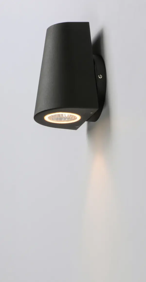 Small scale outdoor lighting perfect for indoor and outdoor applications. The indirect exterior lighting not only provides illumination where you want but also highlights the building structure for a beautiful architectural effect. Available in four finishes: Black, Silver, Architectural Bronze, and White. - alternate view