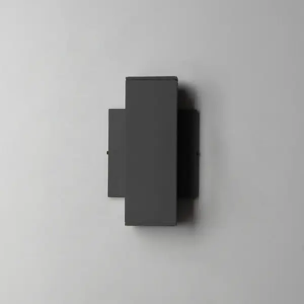 Smaller square profiles extend vertically with ample lighting cast both upward and downwards. The scale of the product is designed to meet ADA requirements, while providing generous light for outdoor applications. Concealed within the frame, there is a range voltage 120-277V LED driver making this a great option for light commercial as well as residential applications. Available in Matte Black, Architectural Bronze and White outdoor powder coat finishes. - alternate view