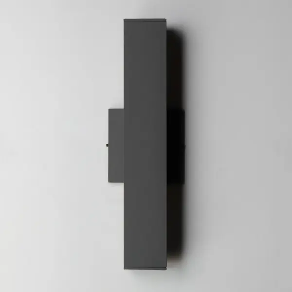 Smaller square profiles extend vertically with ample lighting cast both upward and downwards. The scale of the product is designed to meet ADA requirements, while providing generous light for outdoor applications. Concealed within the frame, there is a range voltage 120-277V LED driver making this a great option for light commercial as well as residential applications. Available in Matte Black, Architectural Bronze and White outdoor powder coat finishes. - alternate view