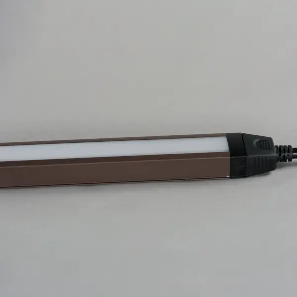 An innovative, slim channel LED light bar. The 120V input Slim Stick connects to a slim direct wire installation junction box where brightness and white color tunable LED light can be adjusted with the touch of a button. The control is the first in the industry to provide color temperature control variable between 2700-5000k on a driverless 120V LED strip. Included with the product, mounting clips allow the user install the channels flat or at an angle up to 90 degrees, so the product can be used in more applications such as cove, task, and closet lighting. - alternate view