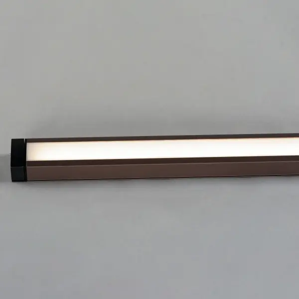 An innovative, slim channel LED light bar. The 120V input Slim Stick connects to a slim direct wire installation junction box where brightness and white color tunable LED light can be adjusted with the touch of a button. The control is the first in the industry to provide color temperature control variable between 2700-5000k on a driverless 120V LED strip. Included with the product, mounting clips allow the user install the channels flat or at an angle up to 90 degrees, so the product can be used in more applications such as cove, task, and closet lighting. - alternate view