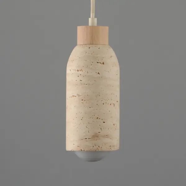 A tribute of natural materials, this collection features carved stone shades in your choice of Travertine or volcanic Lava Rock, paired with coordinating lathed wood bases. The Travertine composition showcases White Oak wood and Ecru white metal accents, while the blackened Lava Rock is beautifully complemented by Walnut wood and a Matte Black finish. Available in versatile pendant and wall sconce configurations, each piece highlights the organic beauty and timeless sophistication of its materials. Collection: Pompeii Finish: Travertine / Oyster Width: 4.75" Height: 11.00" Length: 4.75" Weight: 5.00 lb Wire: 120" Canopy: 4.75"x4.75"x1" Number of Bulbs: 1 Maximum Wattage: 60.00 W Bulb Type: G25 Bulb Base: E26 Medium Light Source: Incandescent Dimmable Voltage: 120.00 V Material: Steel, Wood, Stone Safety Listing: cETLus Safety Rating: Dry Spec Sheet Instructions - alternate view