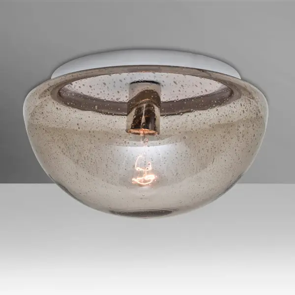 The Smoke Bubble semi-flush ceiling light features hand-blown smoke glass with random bubble accents that create captivating light play. UL wet location rated for covered outdoor areas, showcasing visible filament bulbs.