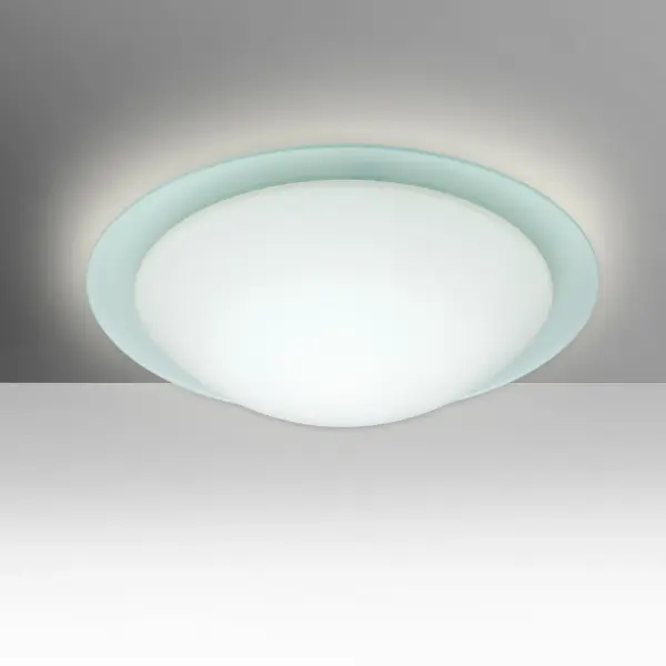 The Ring flush mount combines artisan-crafted white opal and frost glass for a soft, calming glow. Its bayonet mount system offers easy installation while century-old glassmaking techniques ensure quality and character.