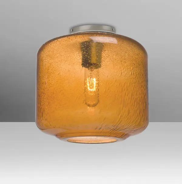 The Niles Amber Bubble brings warmth and visual interest with its transparent amber glass cylinder featuring random bubble accents. The exposed light source creates beautiful light play through the artisan glass.