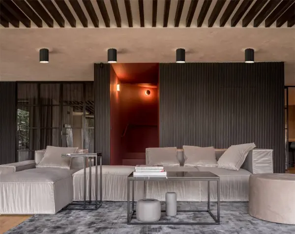 The Lando 2 features a broad fluted glass shade that creates shimmering light effects through its clear lower surface, complemented by a subtle uplight halo. Perfect for spaces needing ambient illumination with visual interest. - alternate view