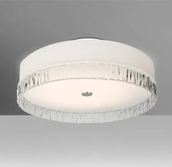 The Paco 19 combines opal and clear textured glass in a sophisticated low-profile design. Its sandstone-like outer texture creates visual interest while the opal layer provides warm, diffused illumination perfect for intimate spaces.