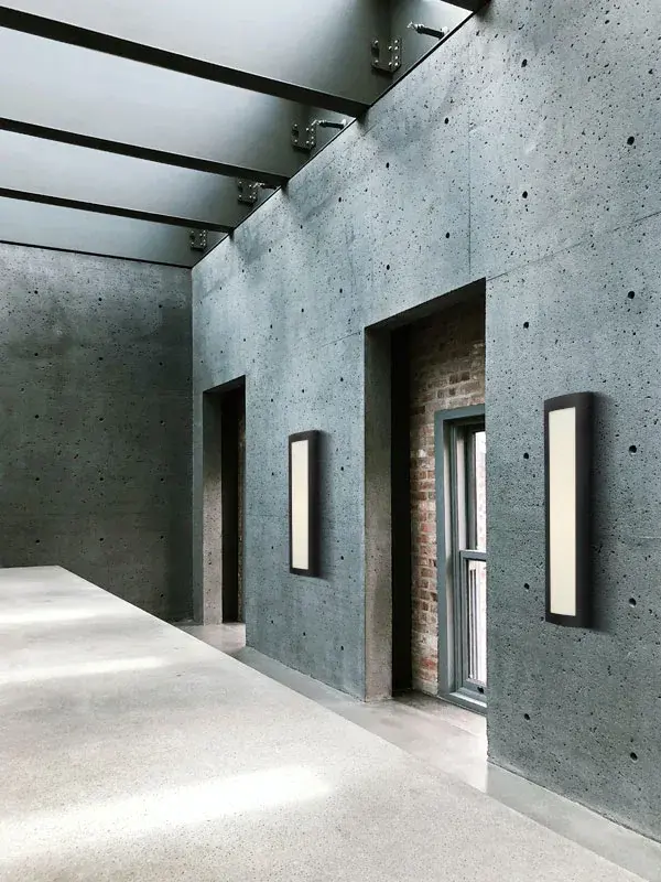 The Expo collection combines a softly arced face with clean vertical lines, creating a handsome architectural statement. Ideal for modern residences and high-profile commercial spaces seeking sophisticated outdoor lighting. - alternate view