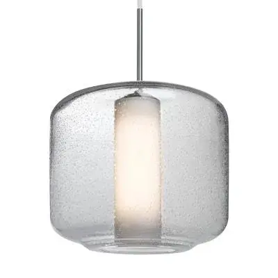 The Niles 10 offers a refined, compact design perfect for smaller spaces or clustered installations. Its satin nickel finish and glass shade provide versatile styling that works across contemporary and transitional interiors.