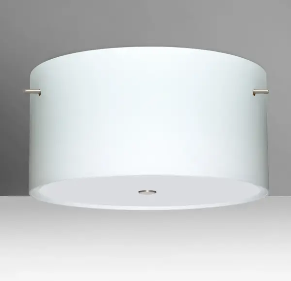 The Tamburo 16 features a classic cylindrical design with handcrafted opal glass that provides a soft, soothing glow. The etched satin finish and artisan craftsmanship create an elegant fixture suitable for various spaces.