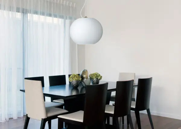 The Jordo pendant combines timeless globe design with artisanal craftsmanship. Its soft white opal glass creates a tranquil glow perfect for modern and classic interiors, while the satin nickel finish adds sophisticated polish. - alternate view