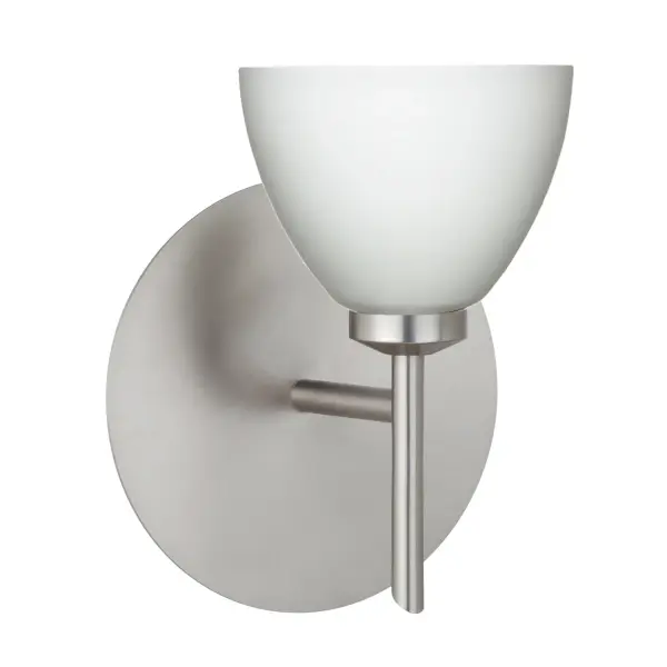 The Divi mini sconce combines timeless bell-shaped design with artisan-crafted opal glass for a soft, tranquil glow. Its etched satin finish and versatile styling make it ideal for both classic and modern interiors.