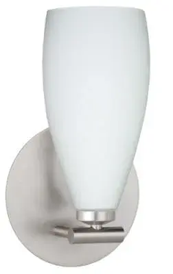 The Karli wall sconce delivers modern sophistication in a compact 5-inch profile. Its satin nickel finish and glass shade create a refined look ideal for bathrooms, hallways, and powder rooms where space is at a premium.