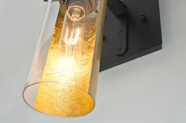 The Duke Gold Foil Sconce combines copper foil-backed glass with clear components for a compelling textured metallic effect. Its gooseneck design and exposed filament create dramatic visual interest perfect for bath and hallway applications. - alternate view
