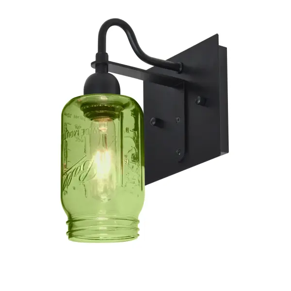 The Milo 4 Green Sconce brings farmhouse charm to transitional spaces with its handcrafted glass shade inspired by traditional canning jars. The subtle green tint creates a warm, inviting glow while the matte black gooseneck mount adds industrial appeal.