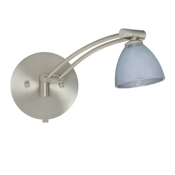The Divi Silver Foil sconce combines classical bell-shaped design with artisanal craftsmanship. Featuring handblown glass with distressed metal foil interior, it creates stunning textured illumination while offering practical adjustability.