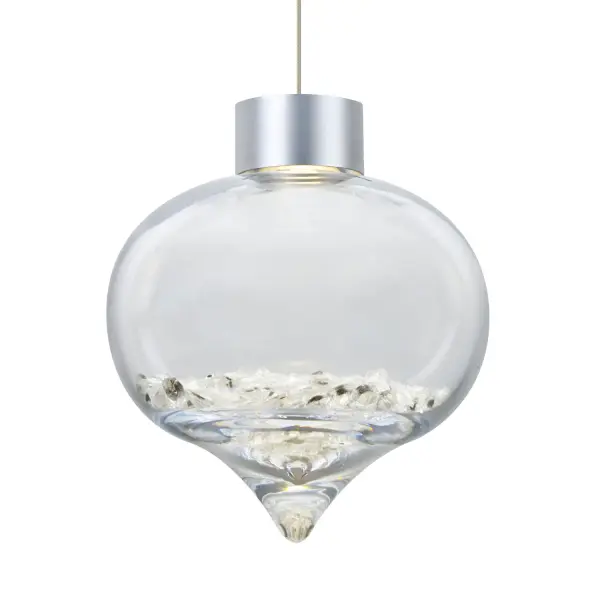The Terra LED Mini Pendant features a unique heart-shaped clear glass design with dimensional crystal accents that create spectacular light refractions. The concealed LED downlight illuminates the cut crystals for a stunning visual display.