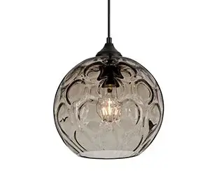 The Bombay Pendant features a beautifully crafted glass globe with an intricate circular optical pattern throughout. Perfect for outdoor spaces, this versatile fixture adds sophisticated lighting to porches and patios.