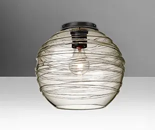 The Wave 10 combines a clear glass globe with a decorative spiral rope wrap, creating visual interest and soft light diffusion. Its compact 10-inch size makes it ideal for smaller spaces needing elegant overhead lighting.