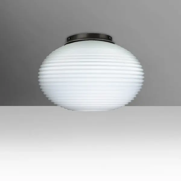 The Pape Opal pendant features handcrafted ribbed glass with a soft white finish that provides tranquil, diffused lighting. Its compact yet distinctive design suits both classic and modern spaces with century-old glassblowing techniques.