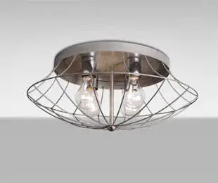 The Spezza semi-flush mount brings urban industrial style with its distinctive woven metal rod construction. Perfect for modern spaces with lower ceilings, it celebrates exposed hardware and light sources.