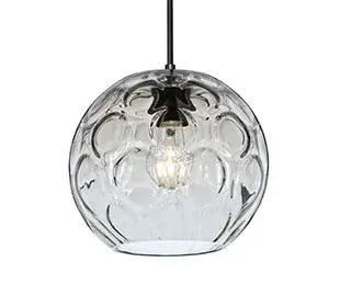 The Bombay pendant features a beautifully crafted glass globe with an intricate circular optical pattern blown throughout the interior, creating visual interest and unique light diffusion. Versatile mounting options and compact size make it adaptable to various spaces.