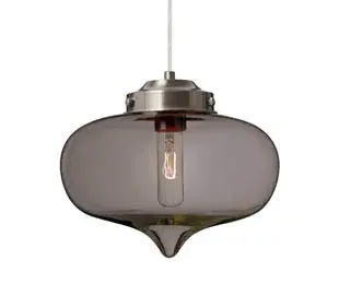 The Mira pendant combines nostalgic heart-shaped design with contemporary sensibility. Its compact 10-inch glass shade and closed bottom create a warm, focused glow perfect for intimate spaces and accent lighting.