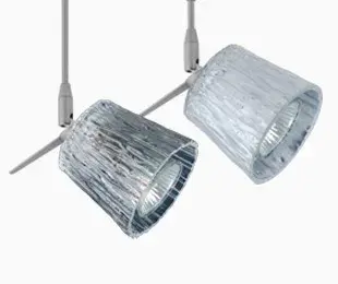 The Nico 3 combines a refined tapered drum glass shade with versatile 12V track mounting, making it ideal for accent lighting in transitional interiors. Its compact 3.25-inch profile works beautifully for highlighting artwork, architectural features, or task areas.