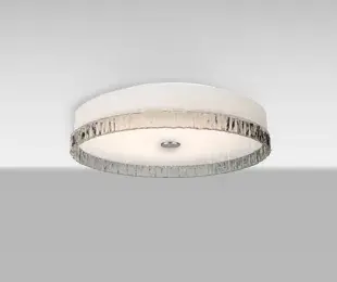 The Paco 12 combines contemporary aesthetics with practical functionality through its unique multi-layered glass construction. Perfect for spaces with lower ceilings or where a subtle lighting presence is desired.