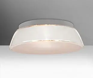 The Pica flush mount features clear blown glass with a distinctive handcrafted sand band applied to the inner surface. The frosted bottom diffuses light beautifully while the glossy outer finish adds elegance.