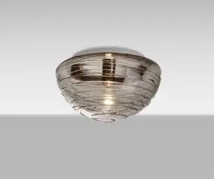 The Wave flush mount combines a classic half-globe shape with a romantic spiral glass rope wrap, creating visual interest while maintaining a low profile. Perfect for spaces with standard ceiling heights.