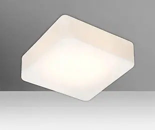 The Geo flush mount offers clean, contemporary design with handcrafted opal glass that provides soft, diffused illumination. Available in multiple sizes and lamping options for versatile applications.