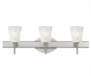The Nico 4 vanity fixture combines a sophisticated tapered drum shade with decorative lampholders and removable finials. Its linear rectangular housing and flexible canopy options make it ideal for modern bathrooms seeking refined style.