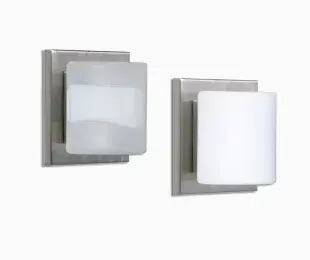 The Paolo wall sconce combines modern design with practical versatility. Its handcrafted glass half-cylinder shade and compact profile make it ideal for bath/vanity applications. ADA-compliant and mountable horizontally or vertically.