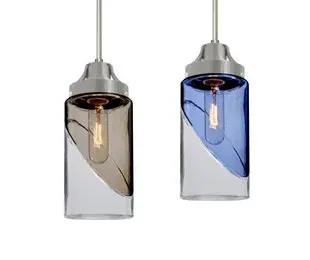 The Blink Pendant features a distinctive cylinder glass shade with a clear bottom and translucent colored top, separated by an artistic elliptical cut. Its compact 4.375-inch diameter makes it perfect for layered lighting or multi-pendant installations.