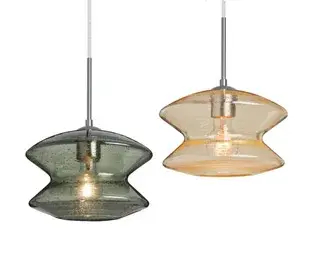 The Zen Pendant features a distinctive hour-glass silhouette with hand-blown bubble patterns that create captivating light diffusion. Its transparent glass design works seamlessly in both traditional and contemporary spaces.