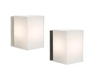 The Tito vanity light combines contemporary design with artisanal craftsmanship. Its handcrafted opal glass shades provide soft, diffused illumination perfect for bathroom vanities, while the low-profile plated bracket maintains a clean, modern aesthetic.