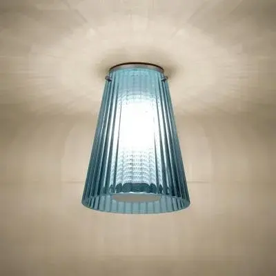 The Dion delivers sophisticated simplicity with its black glass shade and minimal 6-inch profile. Perfect for spaces where ceiling clearance is limited but style matters—hallways, bathrooms, and closets benefit from its clean aesthetic.