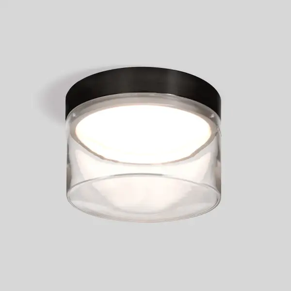The Epic sconce combines the timeless appeal of clear glass with a white acrylic diffuser for soft, even illumination. Its matte black fitter adds modern contrast while the surface mount design offers easy installation.