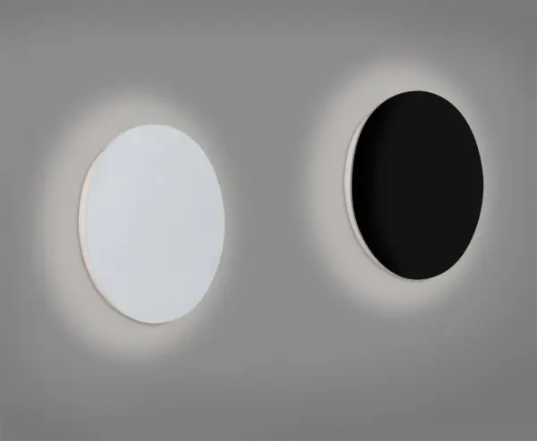 The Halo 10 delivers modern minimalism with edge-lit LED technology that creates a beautiful halo effect on walls. ADA compliant design makes it ideal for accessible spaces while the sleek black finish suits contemporary interiors. - alternate view