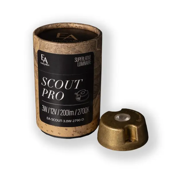 Versatile accessory kit for Scout Pro integrated fixtures featuring a tumbled brass cowl for directional light control and stainless steel ground stakes for secure outdoor mounting.