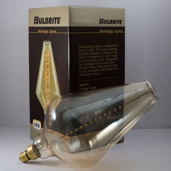 This grand nostalgic bulb combines authentic vintage aesthetics with modern functionality. The diamond-shaped glass showcases a mesmerizing spiral filament that creates warm ambient lighting at 2200K, perfect for exposed bulb fixtures. - alternate view