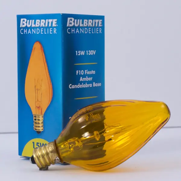 This decorative F10 flame-tip bulb adds warm ambiance with its amber glass finish and 1808K color temperature. Perfect for exposed-bulb fixtures and vintage-style chandeliers where the bulb is part of the design. - alternate view