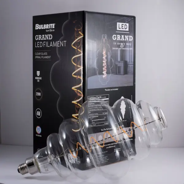 This beehive-shaped LED bulb combines nostalgic spiral filament design with contemporary energy efficiency. At just 4 watts, it delivers 60-watt equivalent brightness with warm 2200K light, perfect for adding decorative flair to any fixture. - alternate view